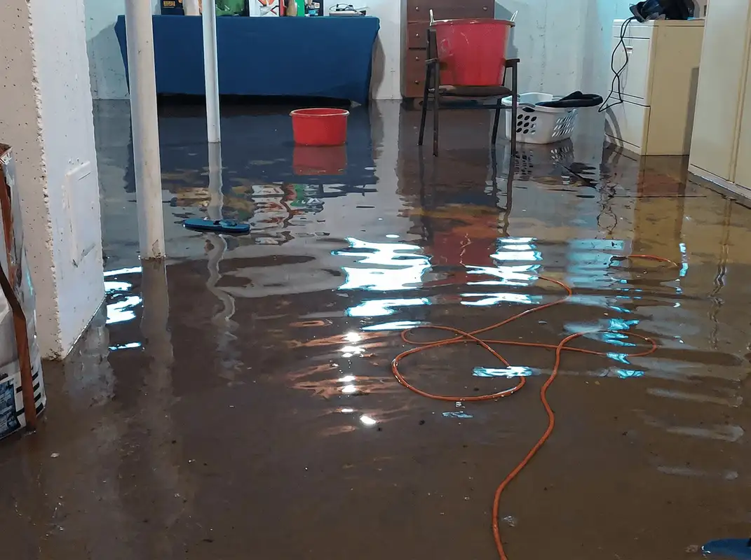 Basement with boiler, cabinets and washing machine completely flooded in Minneapolis, MN